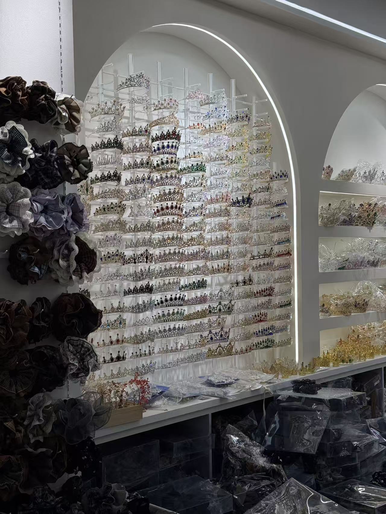 Jewelry and hair-accessory displays reviewed during a supplier-market visit in Yiwu, China